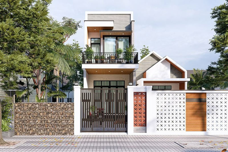 Mặt tiền nhà phố hiện đại với cổng 4 cánh và trụ cổng ốp gạch trang trí.