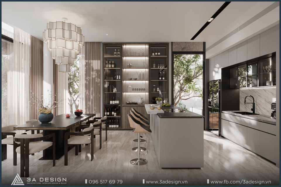 Phòng bếp hiện đại với đảo bếp kết hợp quầy bar, ánh sáng tự nhiên chan hòa, nội thất tinh tế và sắp xếp hài hòa.