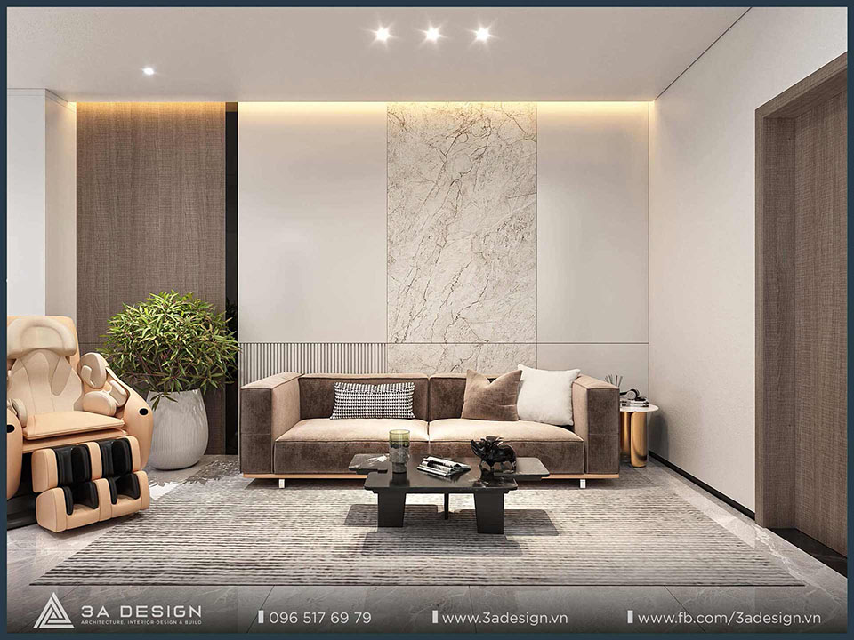 phòng khách hiện đại, sang trọng với sofa màu be, bàn trà đen và các vật liệu ốp tường cao cấp.