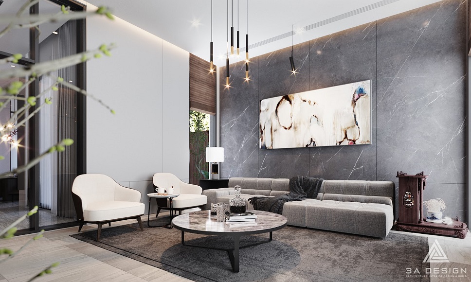 Tranh treo trong nhà trong phòng khách hiện đại, thể hiện không gian sống sang trọng.