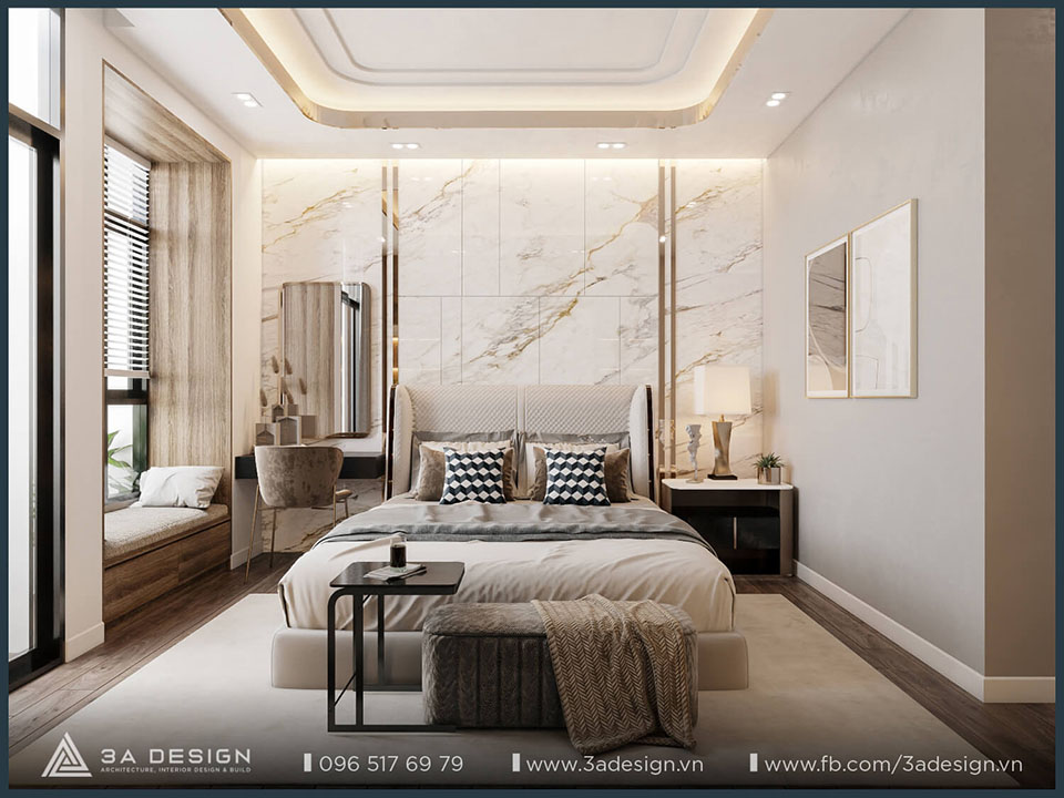 Nội thất phòng ngủ hiện đại, sang trọng, vách ốp đầu giường bằng đá cẩm thạch giả, giường ngủ bọc nệm, bàn trang điểm, bàn tab và đèn trần.