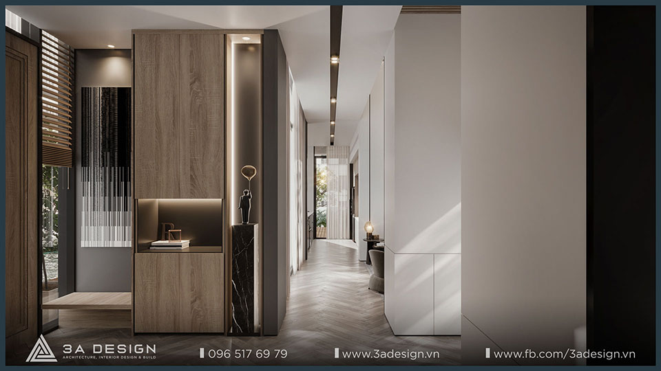 Hành lang nội thất phong cách hiện đại với vật liệu gỗ, ánh sáng gián tiếp, tủ trang trí âm tường và ánh sáng tự nhiên cuối lối đi.