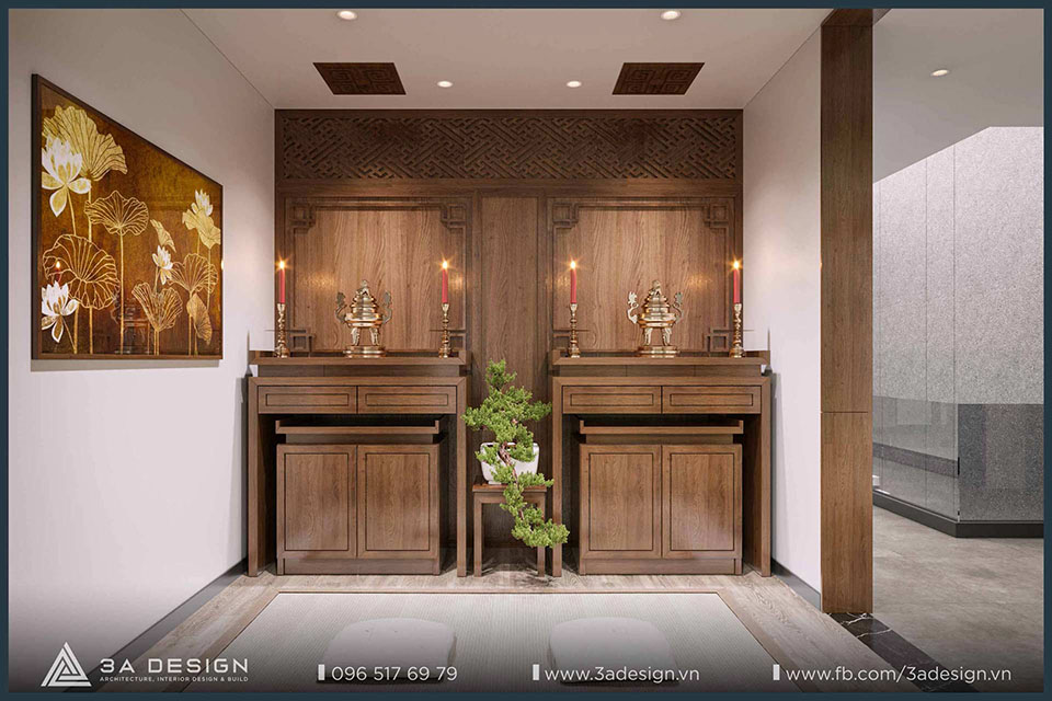 nội thất phòng thờ với hai bàn thờ gỗ đối xứng, bức tường ốp gỗ chạm khắc và một bức tranh hoa sen trang trí.