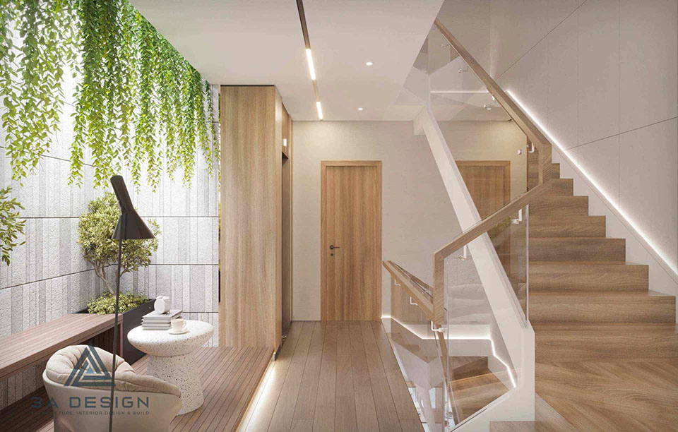 Không gian sống hiện đại với giếng trời và tiểu cảnh xanh, thể hiện xu hướng thiết kế nhà 2026.