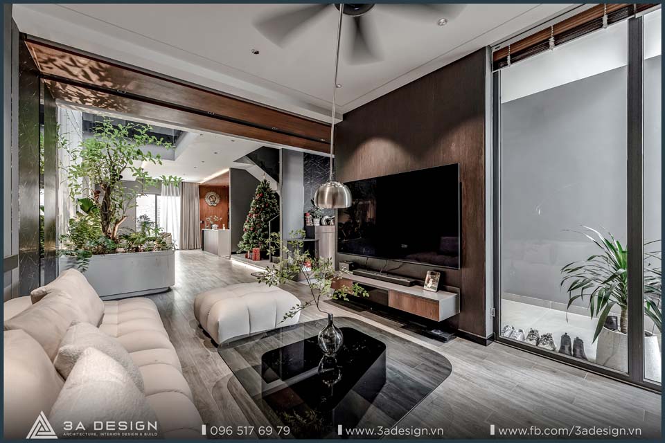 không gian phòng khách của M House – Long Thành, nơi 3A Design ứng dụng thành công giải pháp Tropical Modern vào điều kiện khí hậu nóng ẩm đặc trưng của miền Nam Việt Nam.