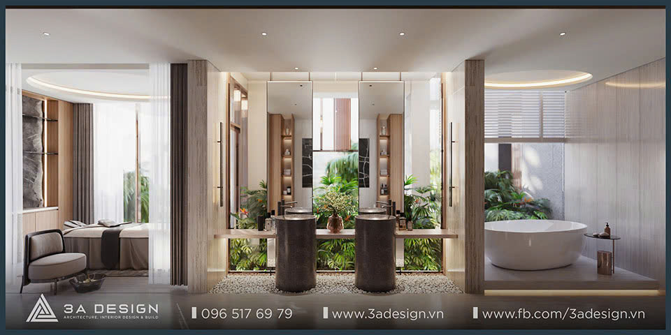 Phòng tắm hiện đại với bồn tắm tròn, bồn rửa đôi và mảng xanh cây cảnh ở trung tâm, kết nối thiên nhiên và nội thất.